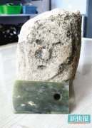 <b>中国最大史前石城墙体现“石雕人面像”(图)</b>