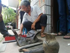 <b>从“临时工”到“周考古”：30余年 他捐献500余件文物给国家</b>